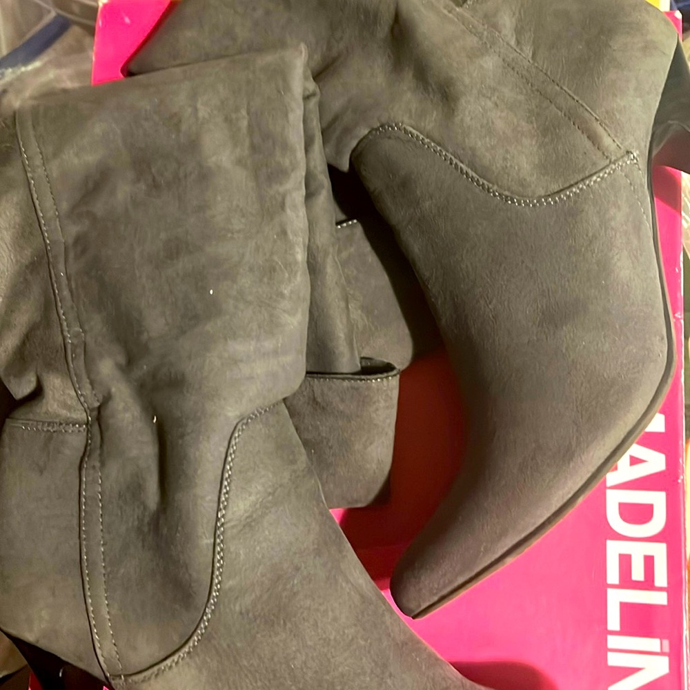 Grey knee length boots
